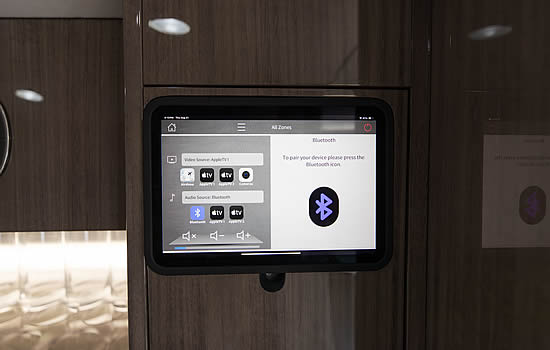 Custom CMS with individual touch panels and ability to stream content from any passenger device to any screen in the cabin